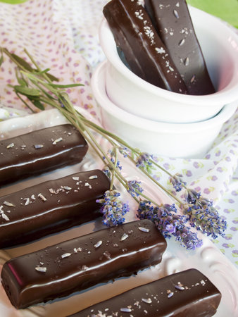 Gourmet lavender chocolate bars on white seving plate.の写真素材