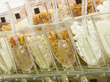 Frozen yogurt toppings bar. Yogurt toppings ranging from fresh fruits, nuts, fresh-cut candies,...