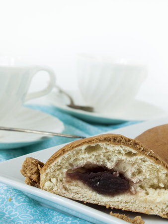 Breakfast with gourmet roti bun and coffee.の写真素材