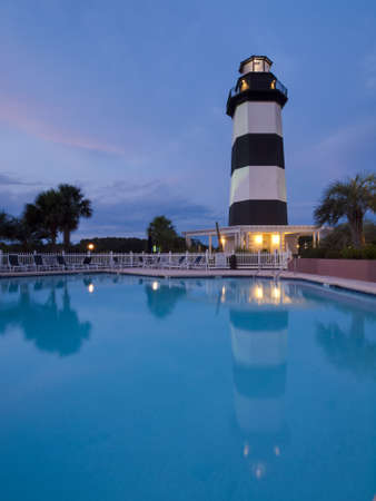 This lighthouse is located in Light Keepers Village, Cogulna Harbor, Little River, SC just off of US-17. It was built in 1985 along the Intracoastal Waterway as a landmark and to honor South Carolina governors.のeditorial素材