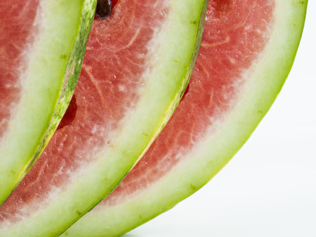 Fresh slices of watermelon on white background.