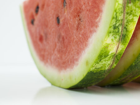 Fresh slices of watermelon on white background.
