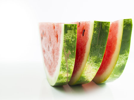 Fresh slices of watermelon on white background.