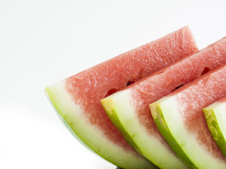 Fresh slices of watermelon on white background.