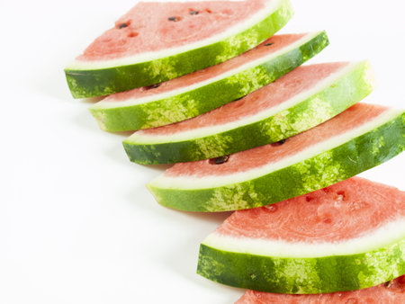 Fresh slices of watermelon on white background.