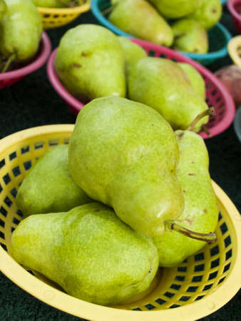 Fresh pears at the local farmer's market.の写真素材