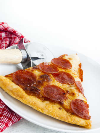 Home made pepperoni pizza served for dinner.の写真素材