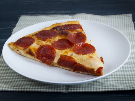 Home made pepperoni pizza served for dinner.の写真素材