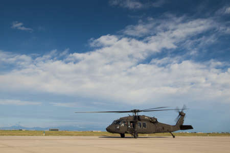 The UH-60 Black Hawk is a four-bladed, twin-engine, medium-lift utility helicopter manufactured by Sikorsky Aircraft. 2012 APW Fly-in Warbirds at Centennial Airport, Centennial, Colorado.のeditorial素材
