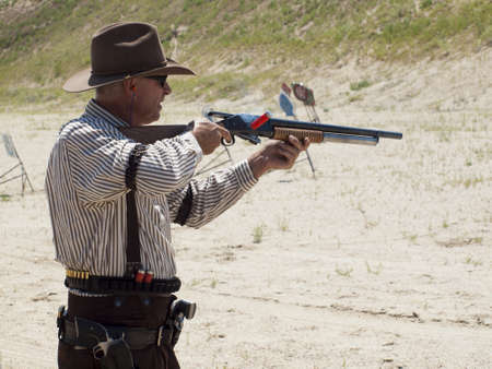 2012 annual match of Colorado Shaketails Cowboy Action Shooting SASS Club.  The firearms used are based on those which existed in the 19th century American West, i.e. lever action rifle, single action revolver, and shotgun.のeditorial素材