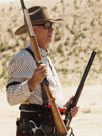 2012 annual match of Colorado Shaketails Cowboy Action Shooting SASS Club.  The firearms used are based on those which existed in the 19th century American West, i.e. lever action rifle, single action revolver, and shotgun.のeditorial素材