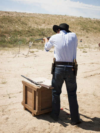 2012 annual match of Colorado Shaketails Cowboy Action Shooting SASS Club.  The firearms used are based on those which existed in the 19th century American West, i.e. lever action rifle, single action revolver, and shotgun.のeditorial素材