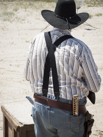 2012 annual match of Colorado Shaketails Cowboy Action Shooting SASS Club.  The firearms used are based on those which existed in the 19th century American West, i.e. lever action rifle, single action revolver, and shotgun.の写真素材