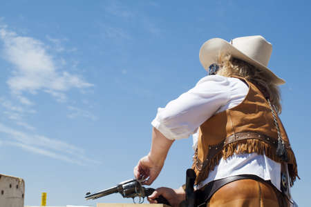 2012 annual match of Colorado Shaketails Cowboy Action Shooting SASS Club.  The firearms used are based on those which existed in the 19th century American West, i.e. lever action rifle, single action revolver, and shotgun.の写真素材