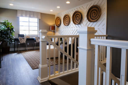 Modern living room with couch and coffee table on second floor of the house.のeditorial素材