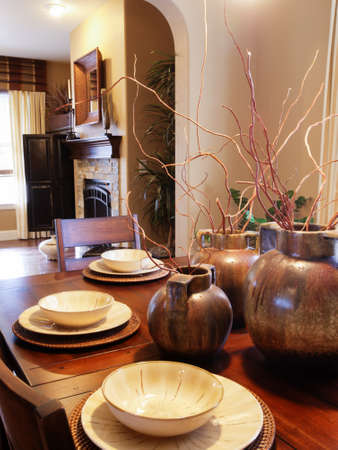 Modern dining room with table set for family dinner.のeditorial素材