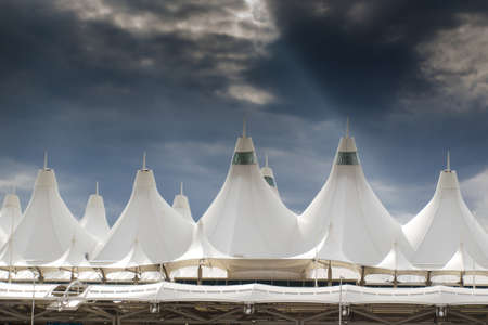 Denver International Airport well known for peaked roof. Design of roof is reflecting snow-capped mountains.のeditorial素材