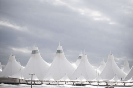 Denver International Airport well known for peaked roof. Design of roof is reflecting snow-capped mountains.のeditorial素材