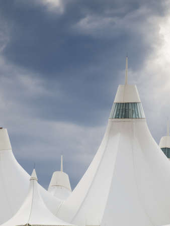Denver International Airport well known for peaked roof. Design of roof is reflecting snow-capped mountains.のeditorial素材