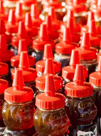 Local honey at the local farmers market. Farmers markets are a traditional way of selling agricultural products.のeditorial素材
