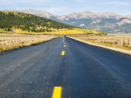 Newly paved road on autumn day in Colorado.のeditorial素材