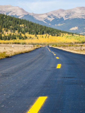 Newly paved road on autumn day in Colorado.のeditorial素材