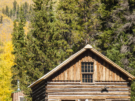 Rustic hunting cabin in Autumn forest in Colorado.のeditorial素材