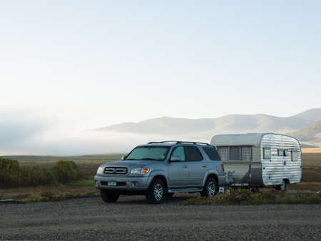 Motorhome campsite near the lake on early morning late in the season.のeditorial素材