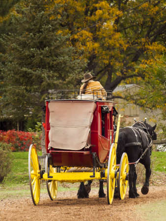 Old traditional horse-drawn ride for kids. 2012 Pumpkin Harvest Festival at Four Mile Historic Park, Denver.のeditorial素材