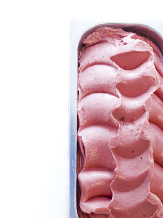 Gourmet sweet orange and cranberry gelato on white background.の写真素材