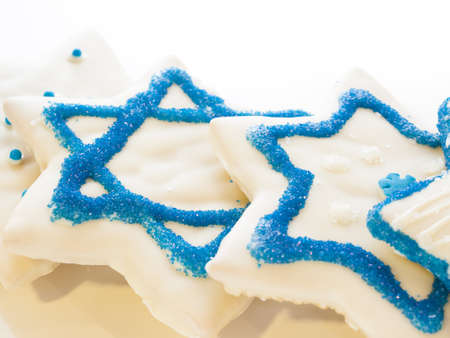 Gourmet cookies decorated with white icing for Hanukkah.の写真素材