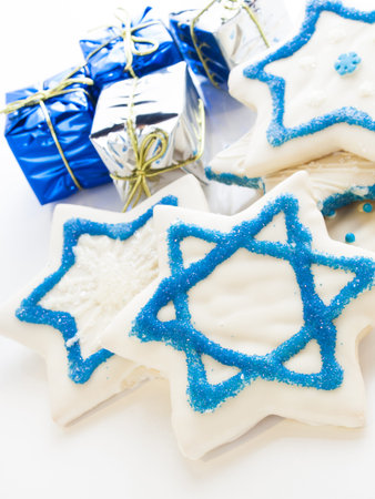 Gourmet cookies decorated with white icing for Hanukkah.の写真素材