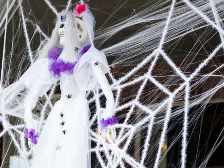Halloween decorations in the front yard of a house on Halloween.の写真素材