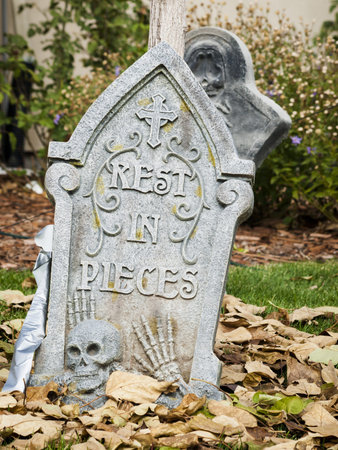 Halloween decorations in the front yard of a house on Halloween.の写真素材