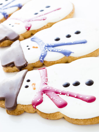 Gourmet snowman cookies on white background.の写真素材