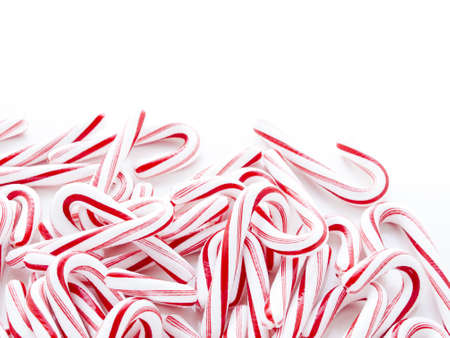 Peppermint candy canes on white background.の写真素材