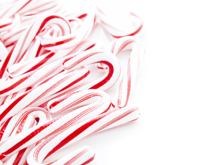 Peppermint candy canes on white background.