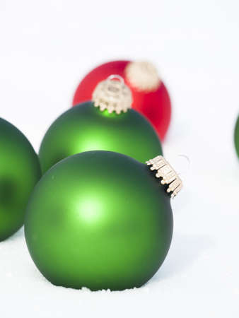 Christmas ornaments in virgin snow.の写真素材