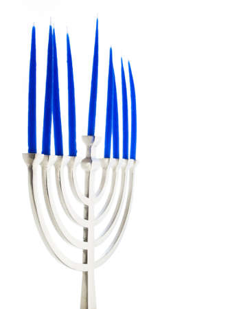 Contemporary menorah with blue candels on white background.の写真素材