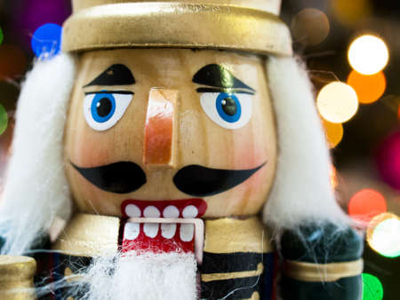 Nutcracker with Christmas tree in the backgound.の写真素材