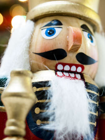 Nutcracker with Christmas tree in the backgound.の写真素材