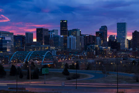 Beautiful sunrise with blue and pink sky over the mile high city of Denver, Colorado.のeditorial素材