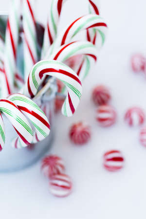 Peppermint candy canes on white background.の写真素材