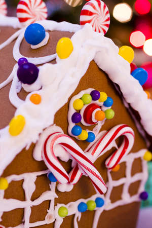 Gingerbread house with small presents.の写真素材