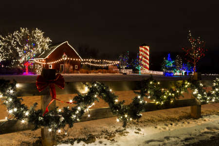 Historic farm decorated with Christmas lights.のeditorial素材