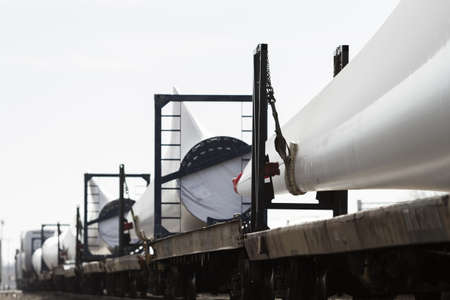 Wind turbine blades waiting to be transported to final location.のeditorial素材