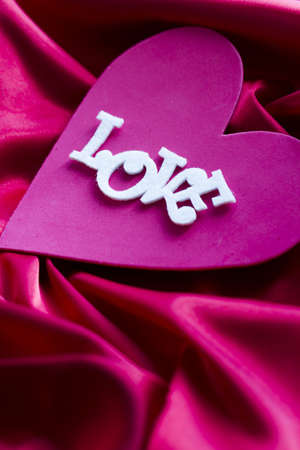 White Love sogn on pink heart.の写真素材