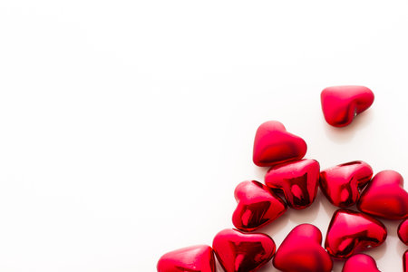 Heart shaped cookies decorated fancy icing patterns.の写真素材