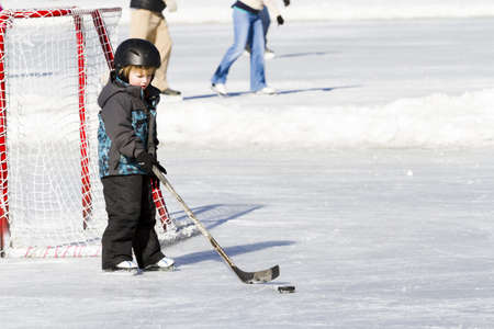 2012-2013 Winter Season. Ice skating on Evergreen Lake, Colorado.のeditorial素材