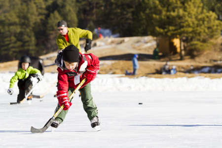 2012-2013 Winter Season. Ice skating on Evergreen Lake, Colorado.のeditorial素材